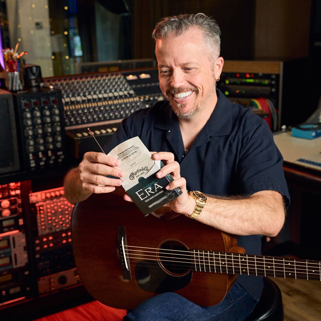 Jason with his signature guitar and signature strings