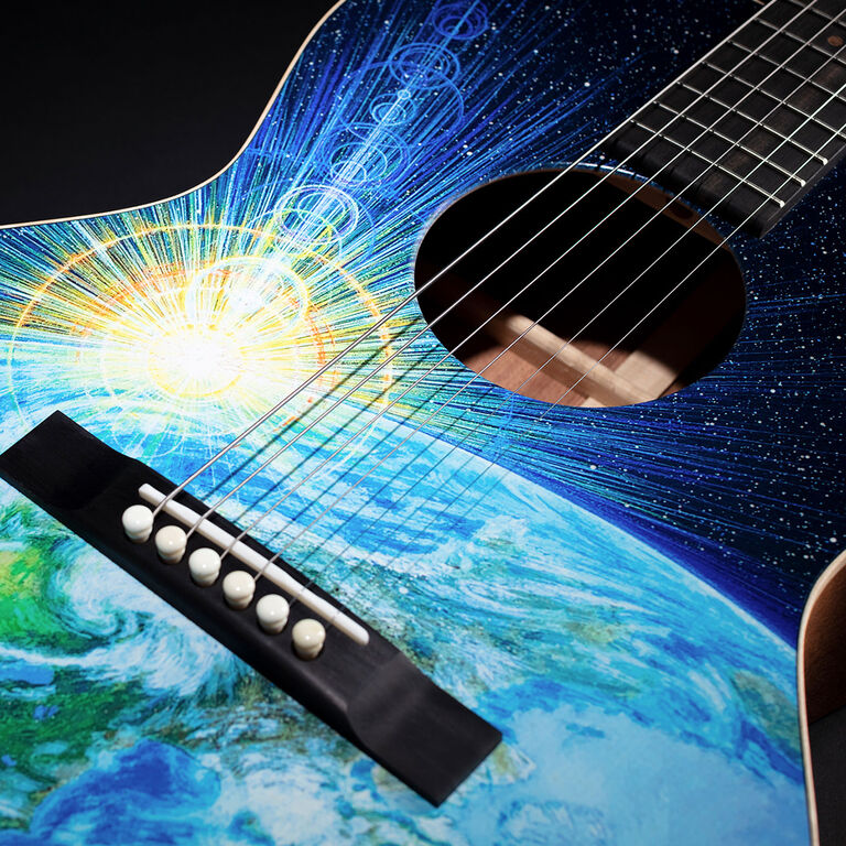 Dramatic photo of Martin 00L-Earth guitar.