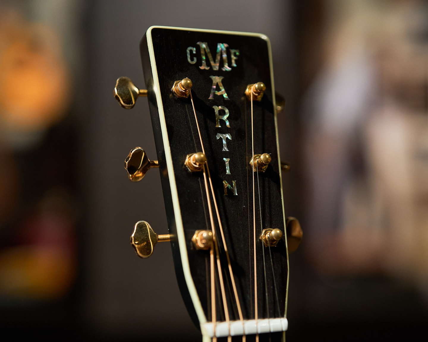 Photo of a black guitar headstock