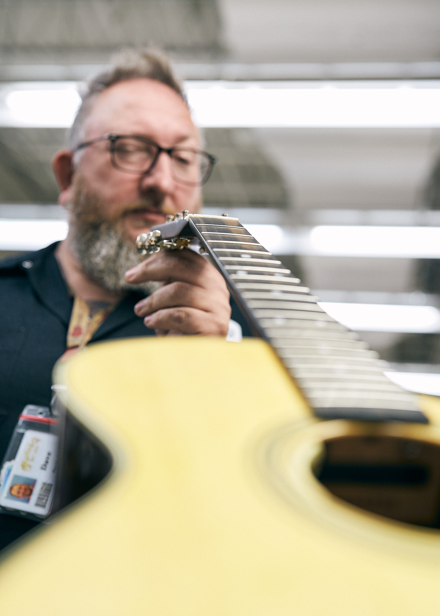 Closeup of guitar strings on an acoustic guitar