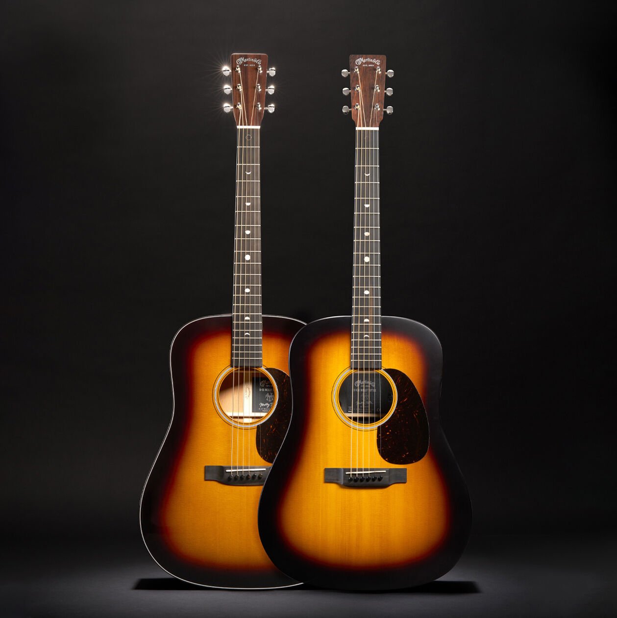 The two Molly Tuttle signature guitars arranged next to each other