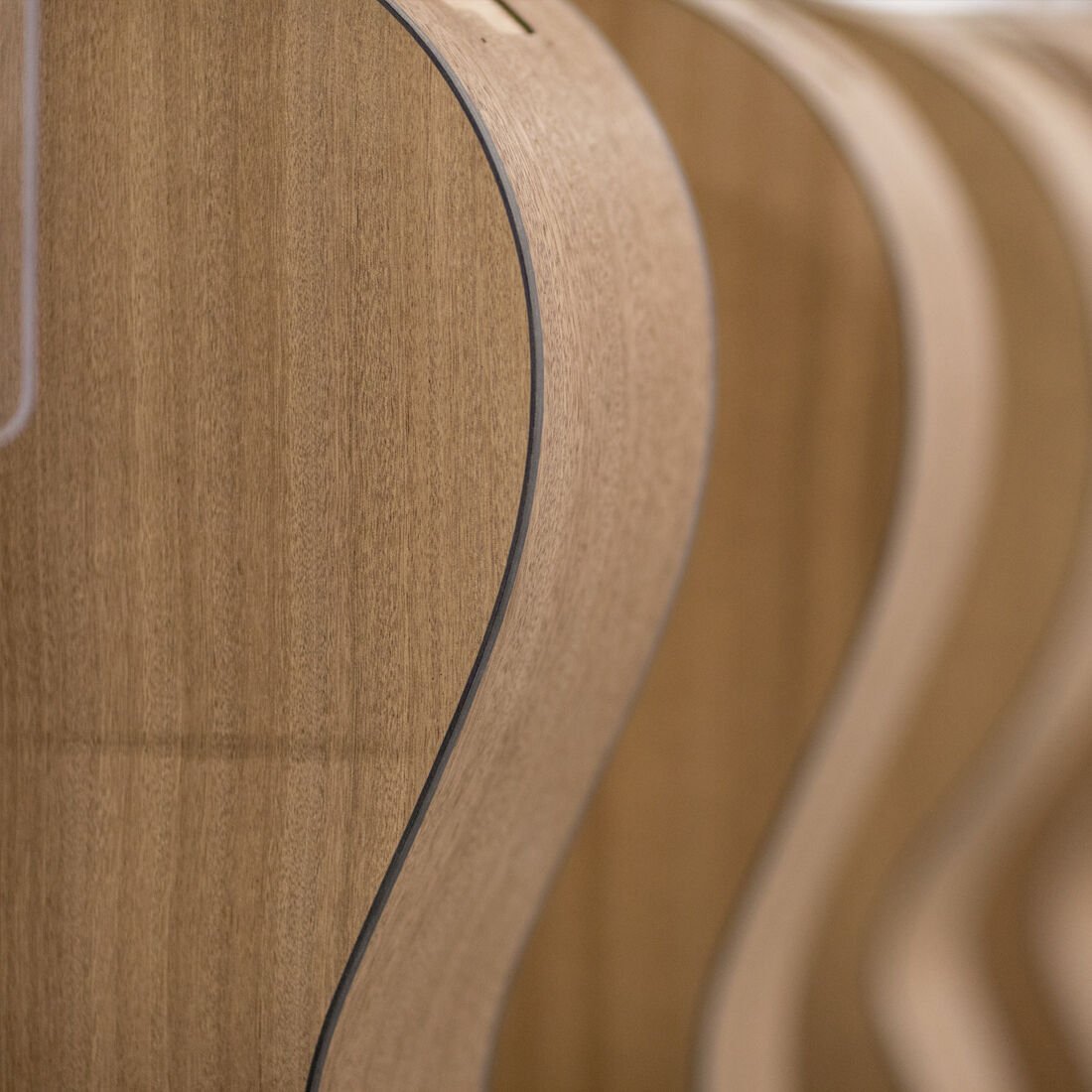 Row of guitar bodies Row of guitar bodies