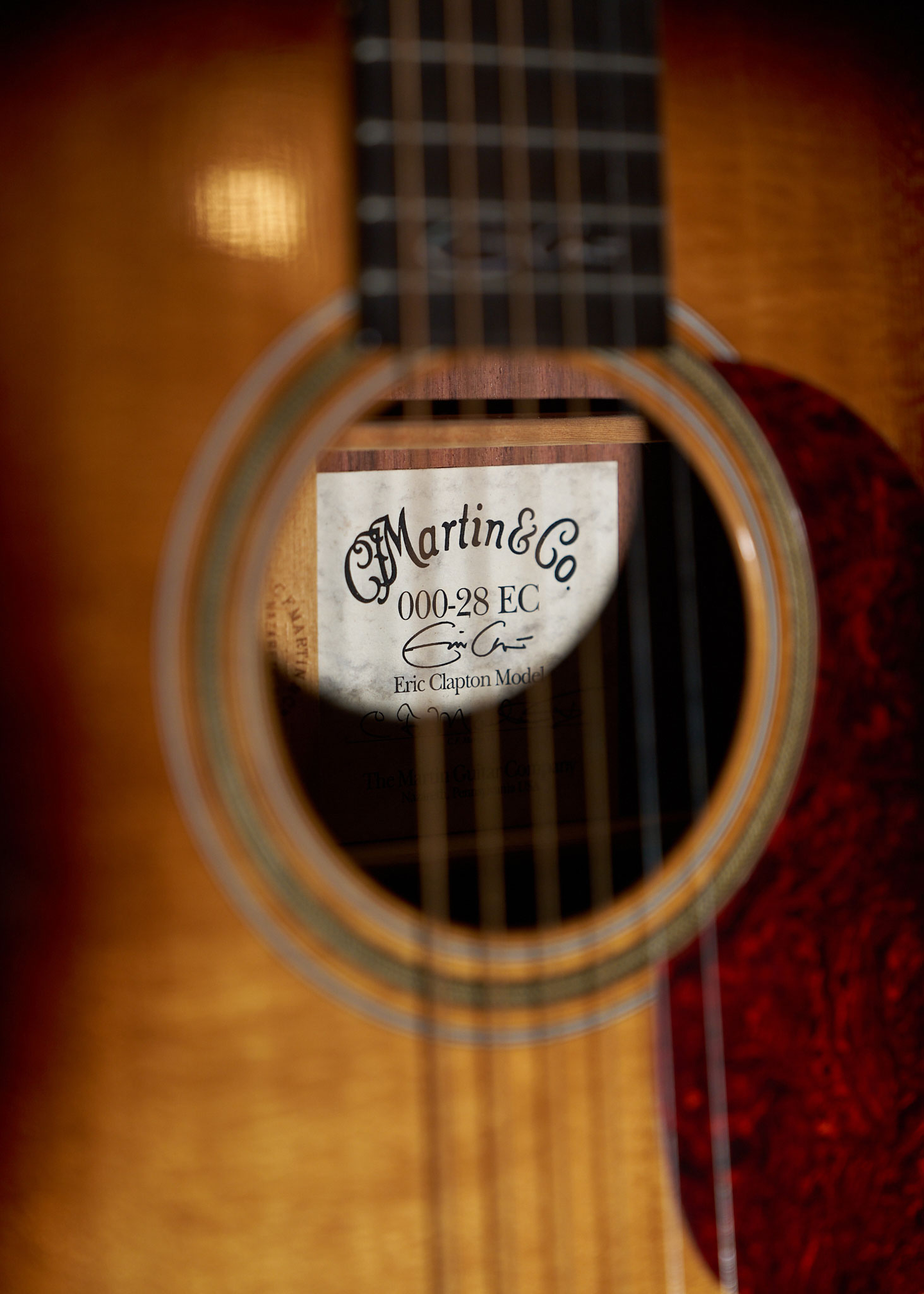 Photo of a label inside an acoustic guitar Photo of a label inside an acoustic guitar