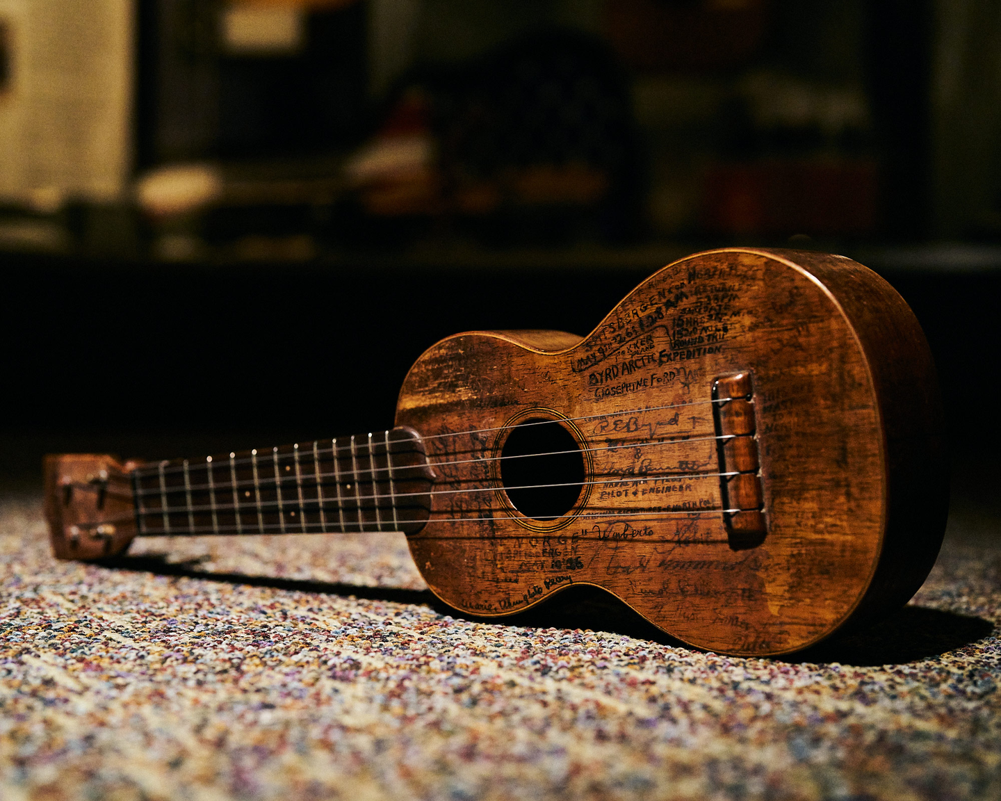Richard Konter's ukulele with signatures on it