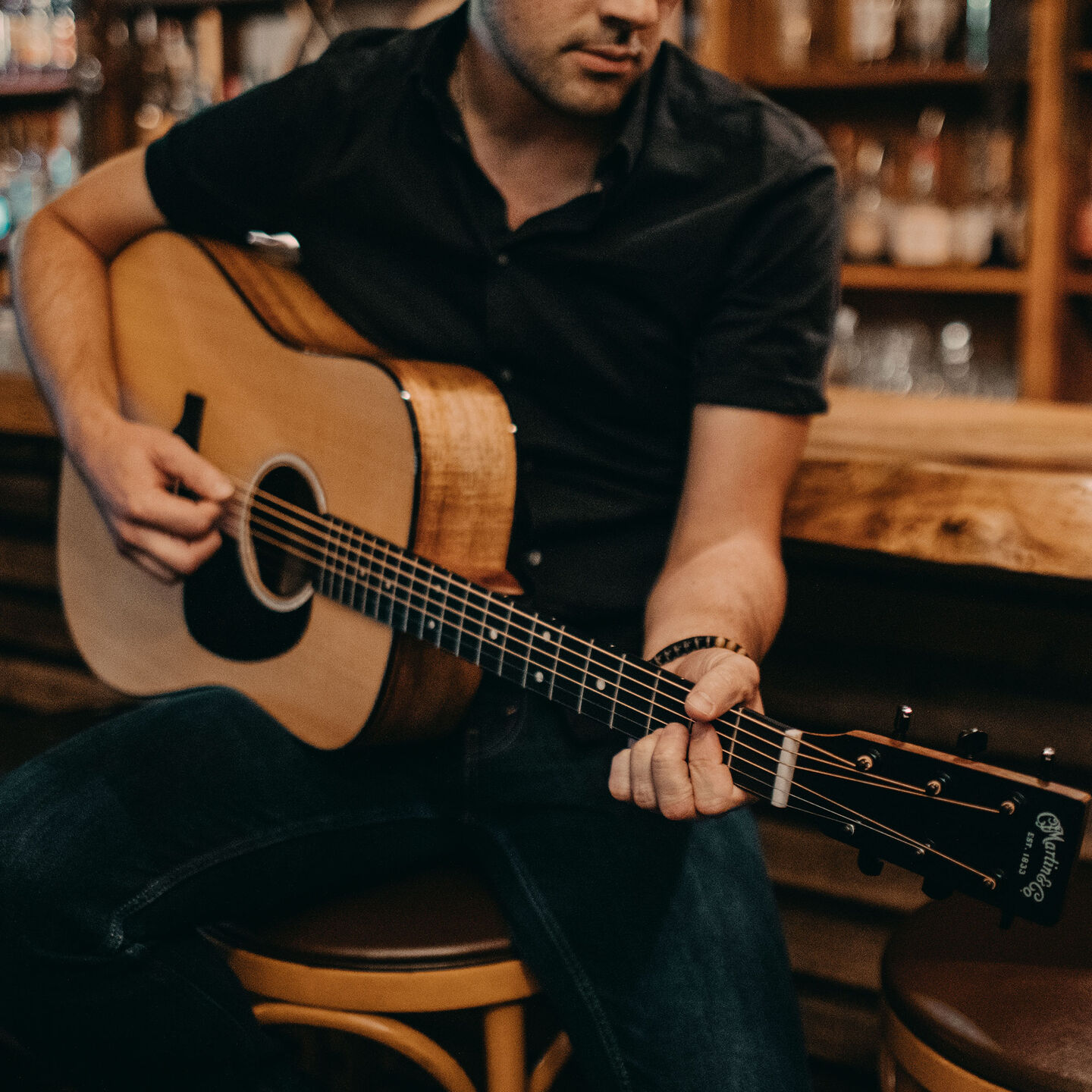 Person playing guitar