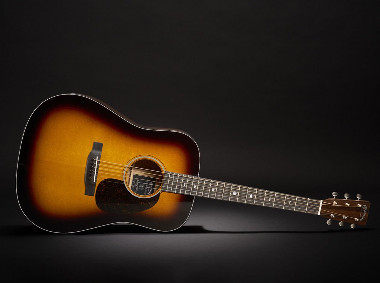 Molly's D-18 on a black background with soft light cast on it