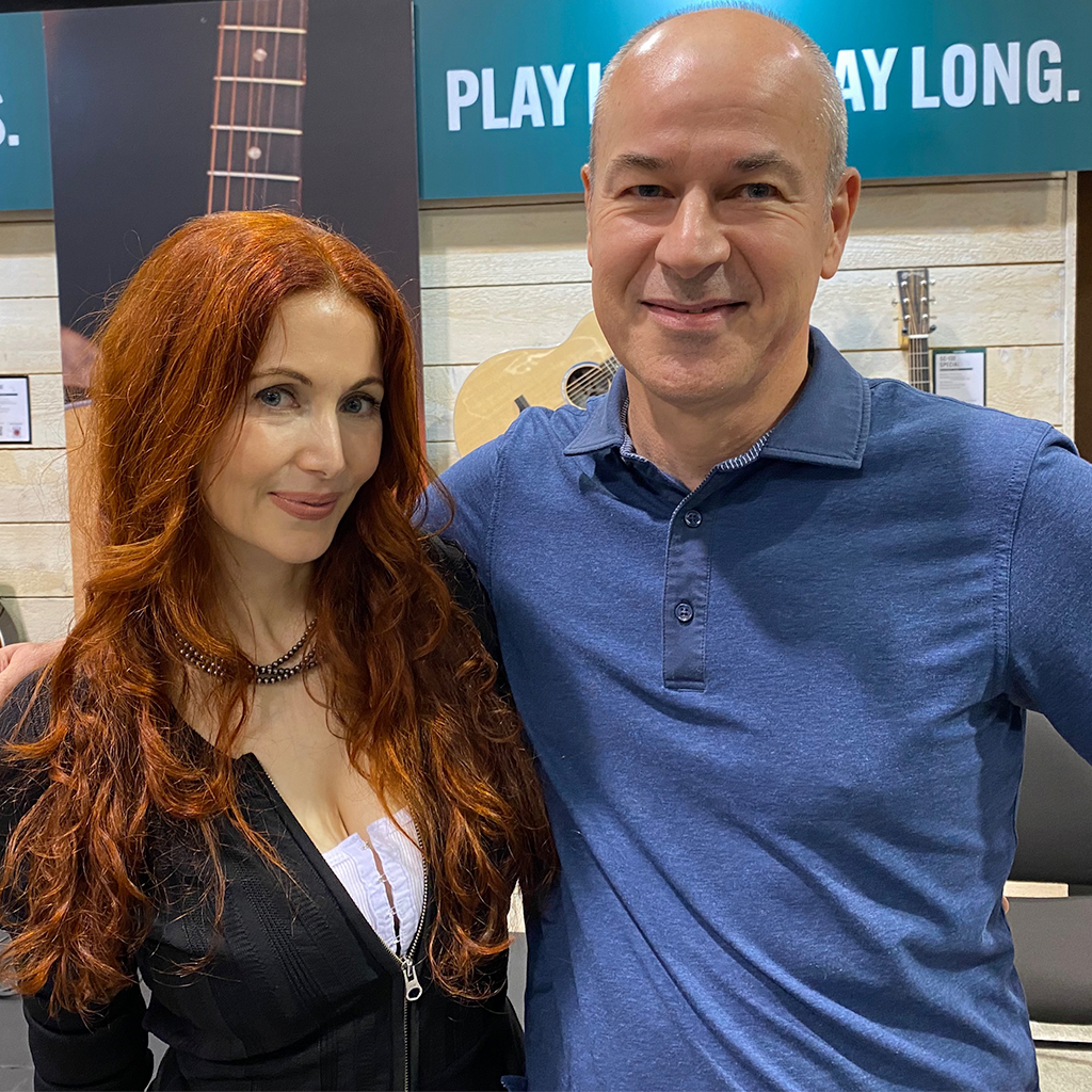Musician Gretchen Menn and Martin Guitar CEO Thomas Ripsam at NAMM Musician Gretchen Menn and Martin Guitar CEO Thomas Ripsam at NAMM