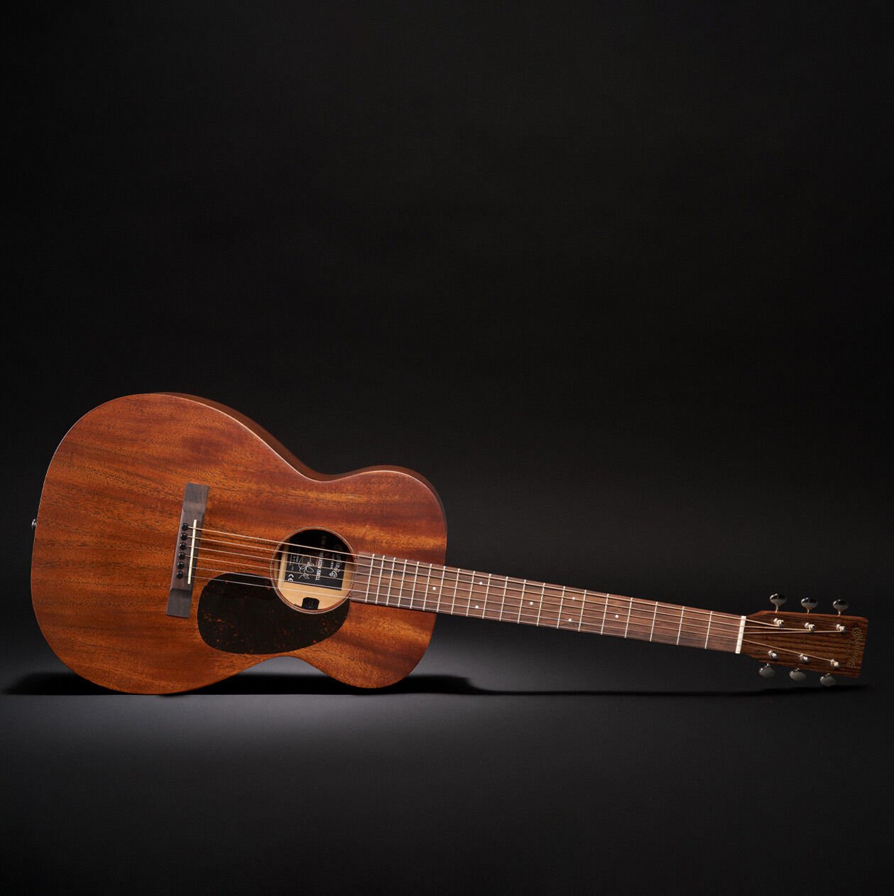 The Jason Isbell signature acoustic guitar on a black background