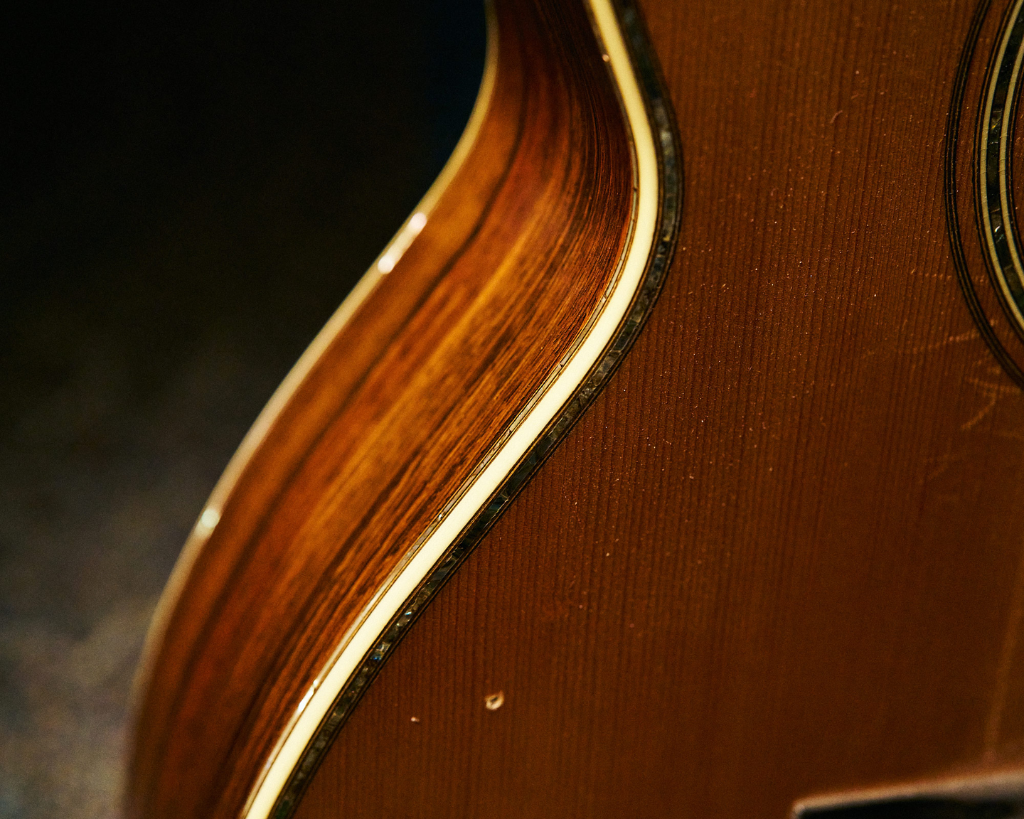 Side of John's guitar