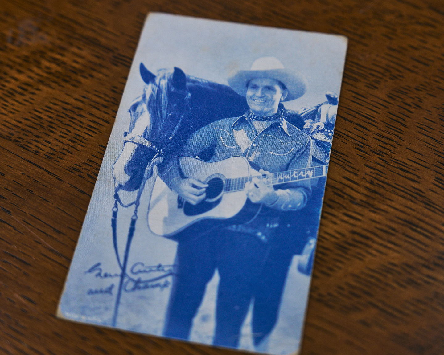 A pamphlet featuring Gene Autry holding a D-45