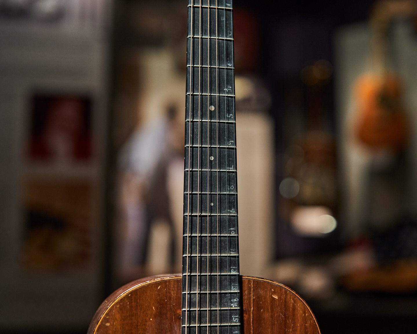 Closeup of an acoustic guitar neck