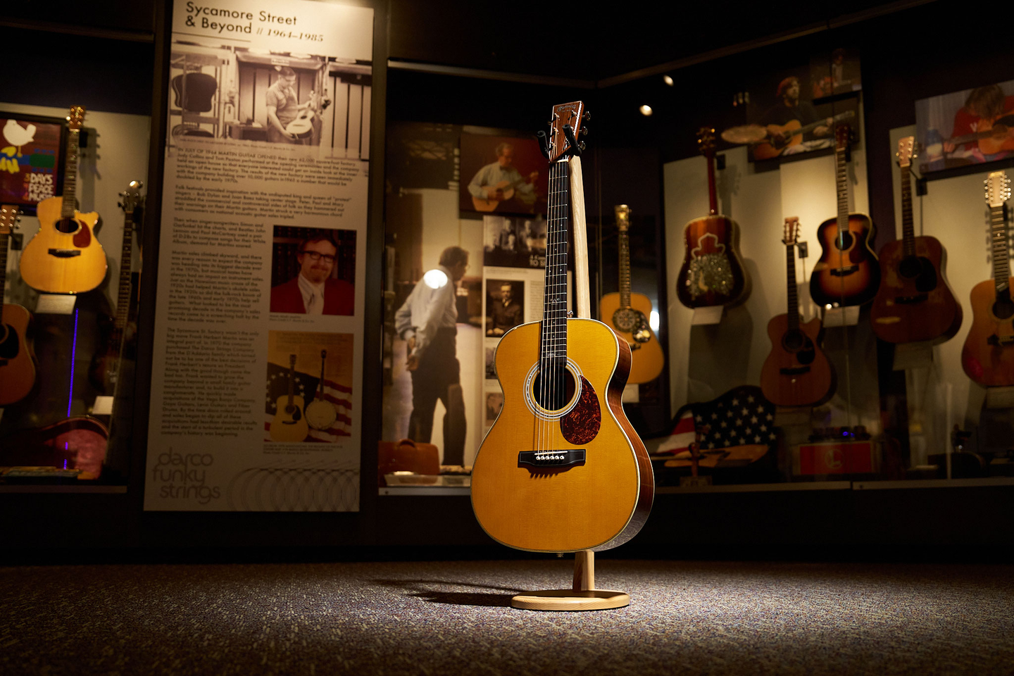 The OM-JM John Mayer martin sitting on a stand in the Martin Museum The OM-JM John Mayer martin sitting on a stand in the Martin Museum
