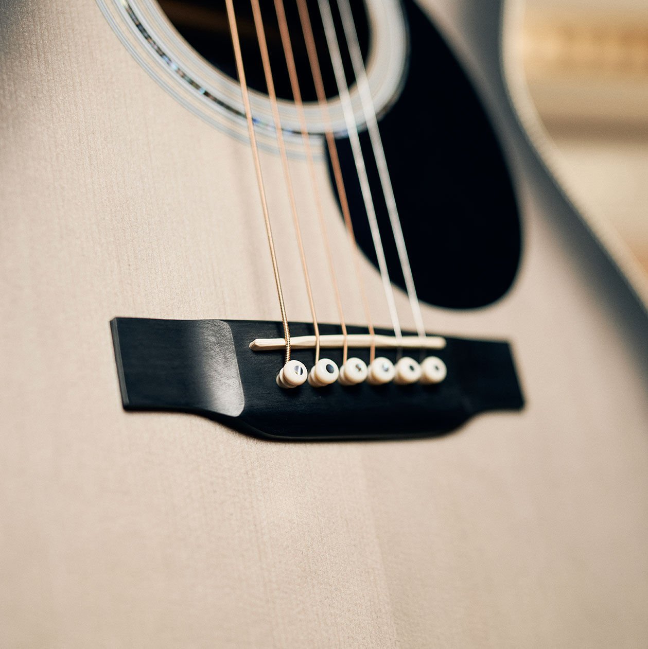 Pic of guitar body with bridge visible Pic of guitar body with bridge visible