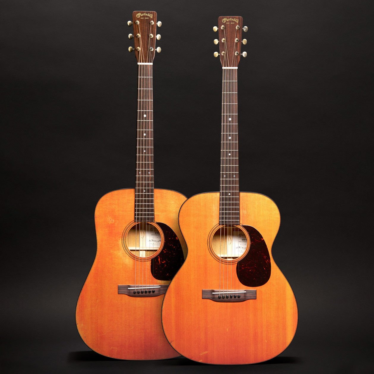 Two acoustic guitars side by side Two acoustic guitars side by side