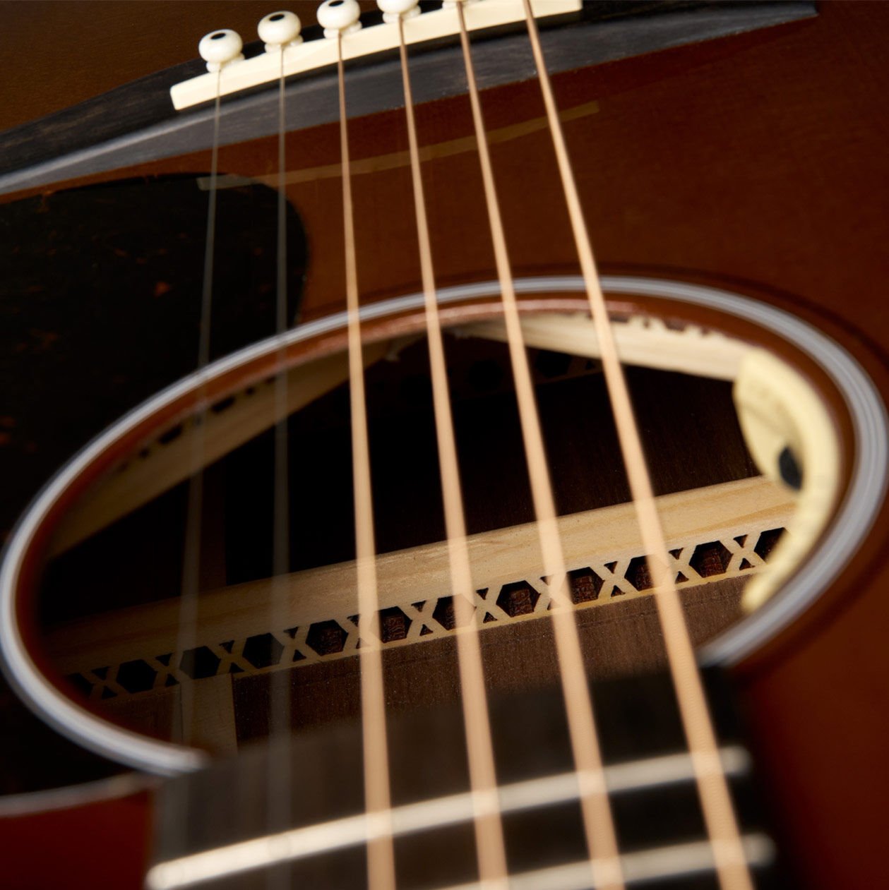 An acoustic guitar sound hole