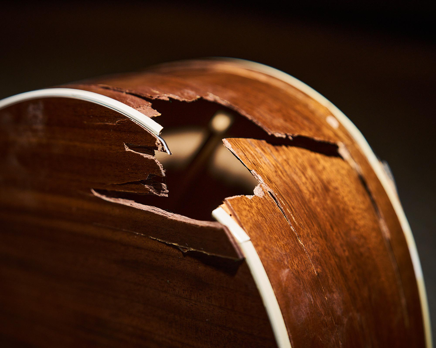 The broken shoulder of a Martin acoustic