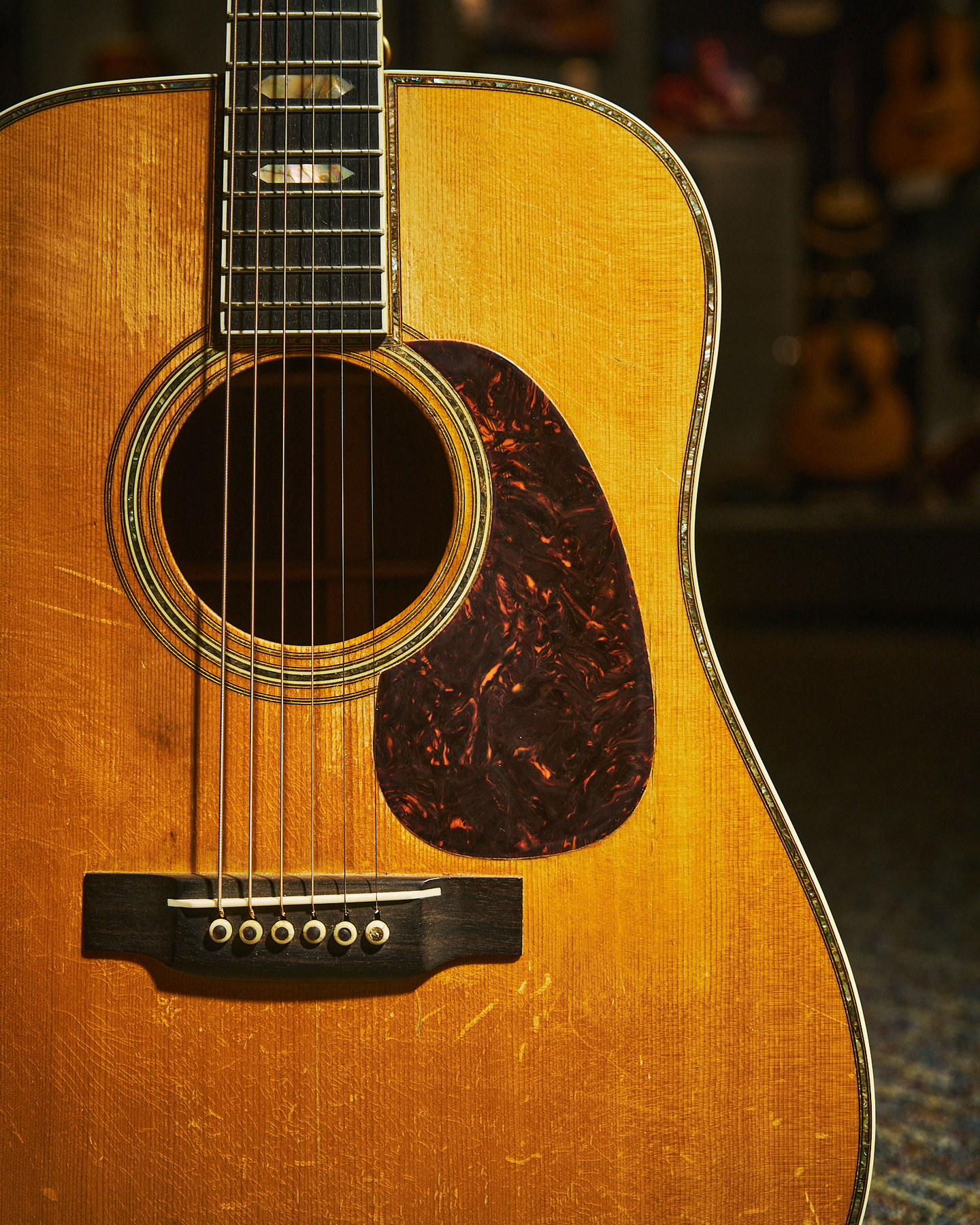Closeup of the front of a pre-war D-45 acoustic guitar body