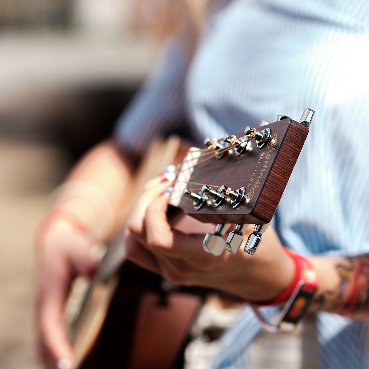 Person playing plugged in on stage or in studio 