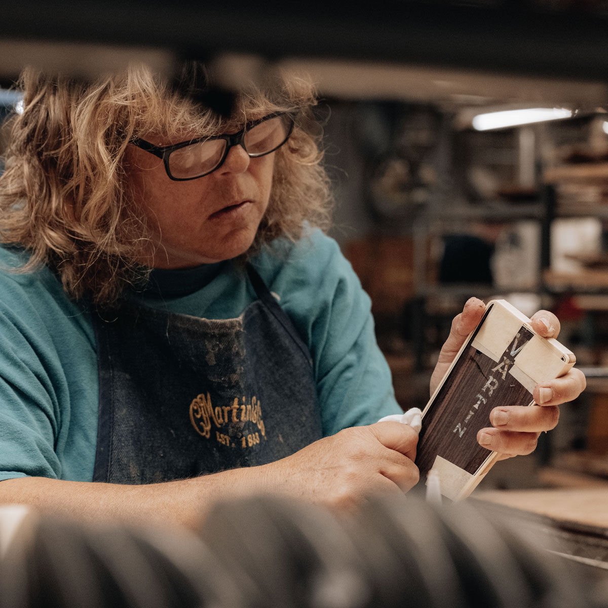 A person making a headstock