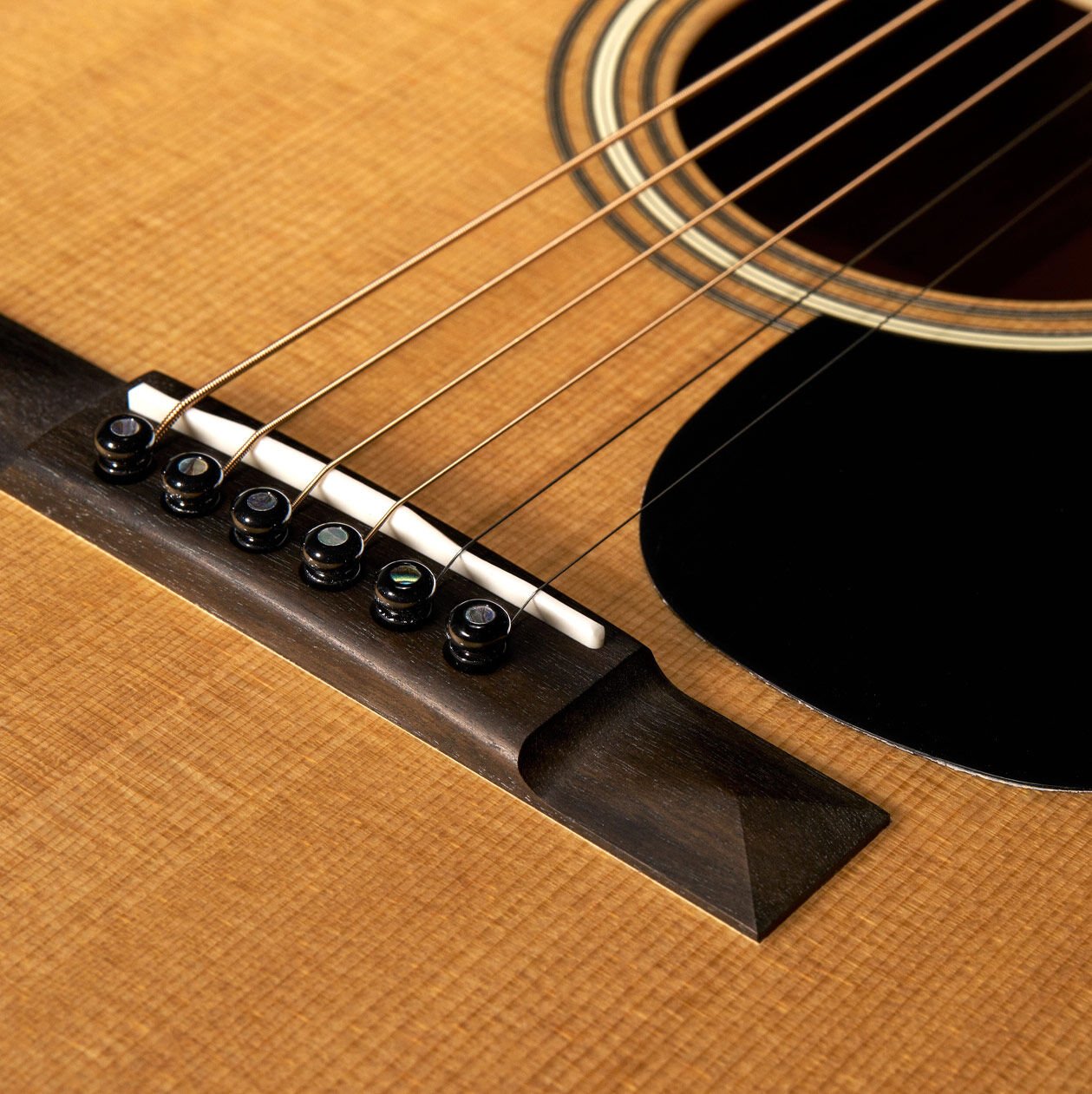 The OM Mikael Akerfeldt acoustic guitar on black background