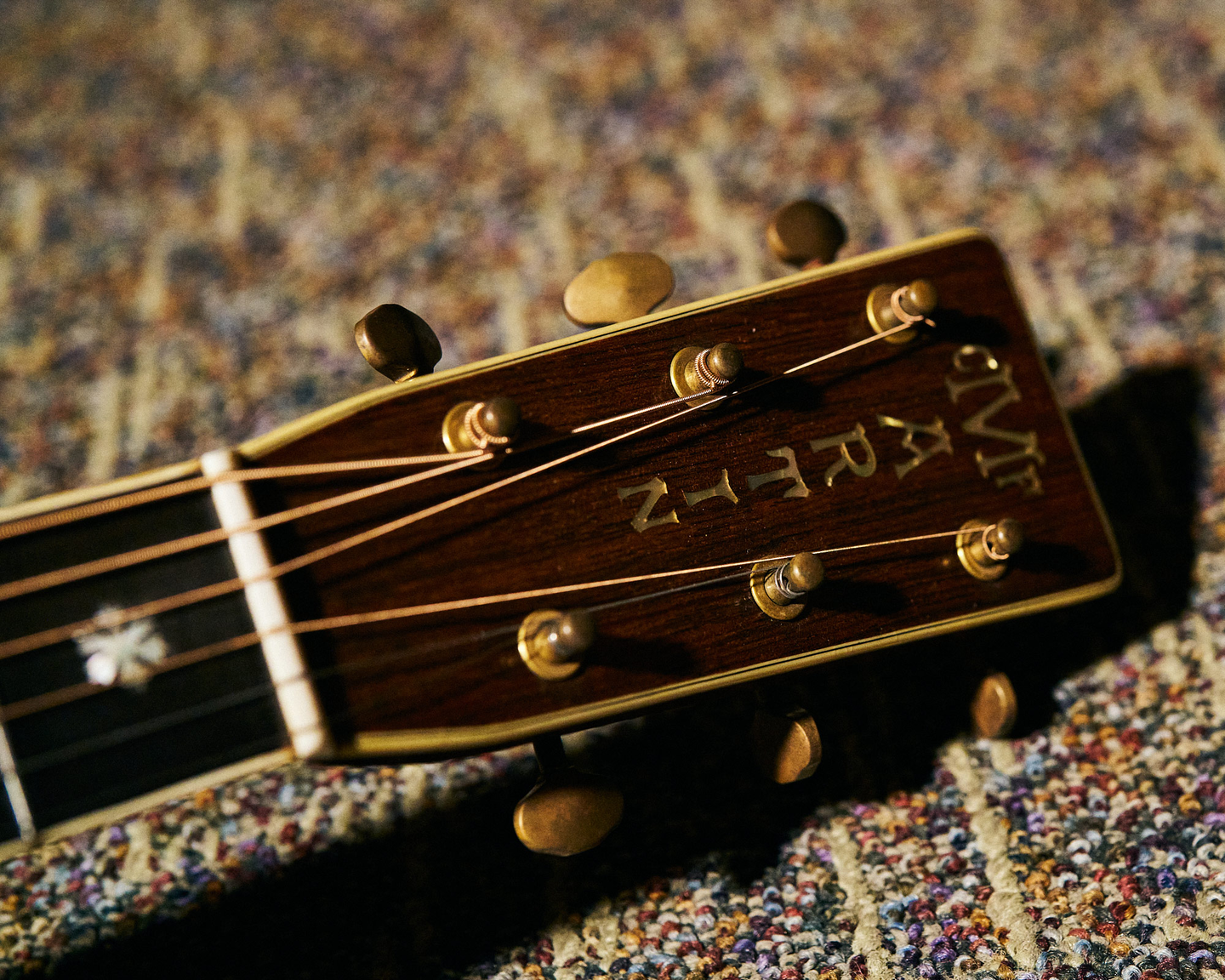 Headstock of John's guitar