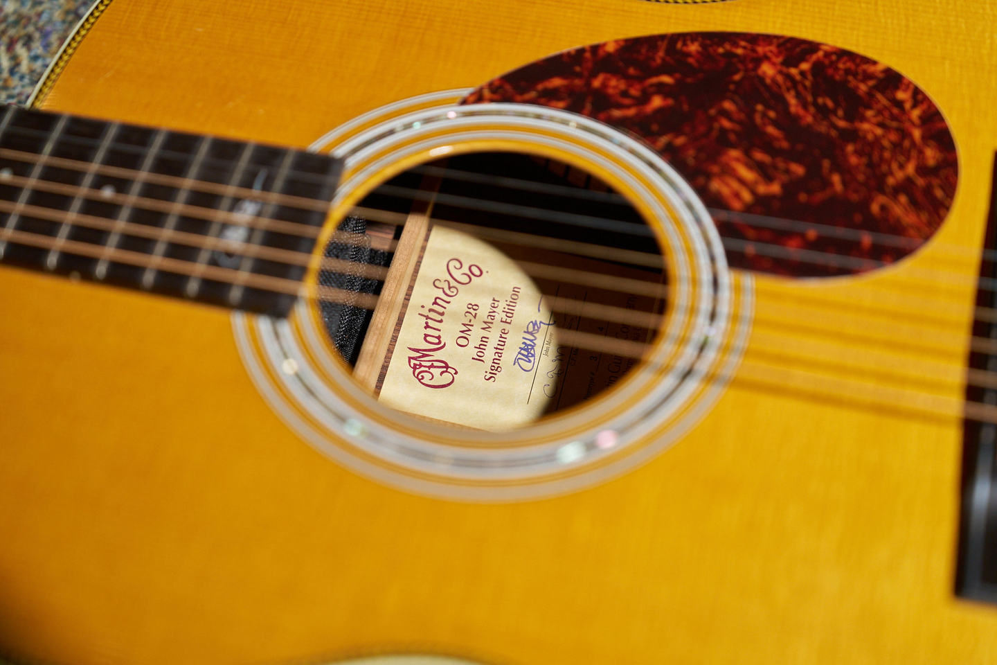 Photo of the label inside the John Mayer acoustic guitar Photo of the label inside the John Mayer acoustic guitar