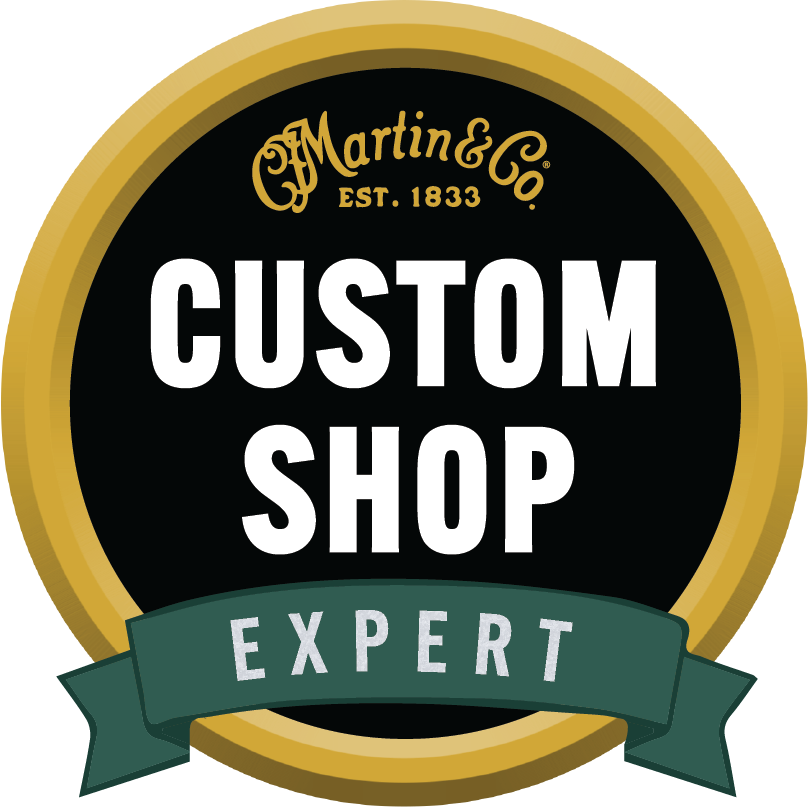 A badge that says C.F. Martin & Co Custom Shop Expert A badge that says C.F. Martin & Co Custom Shop Expert