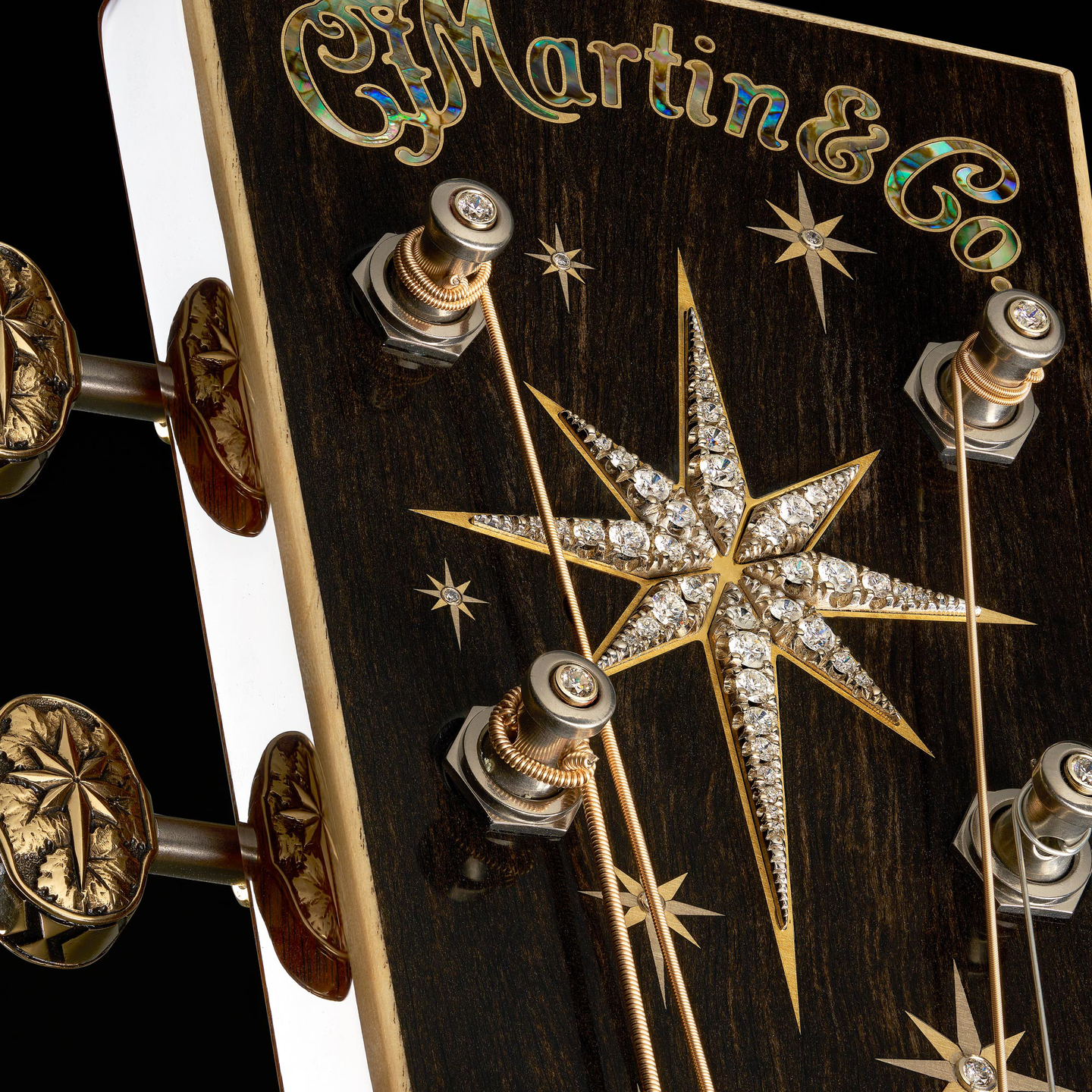 Diamond-encrusted star on a Martin headstock