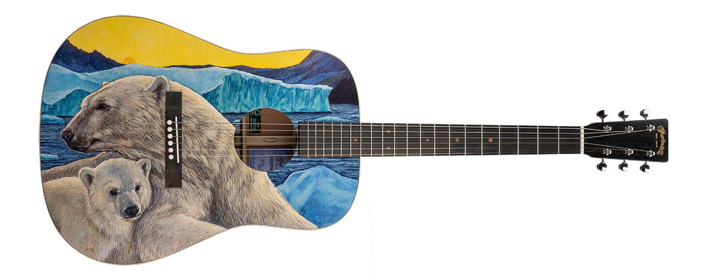 Acoustic guitar with a painting of polar bears on it