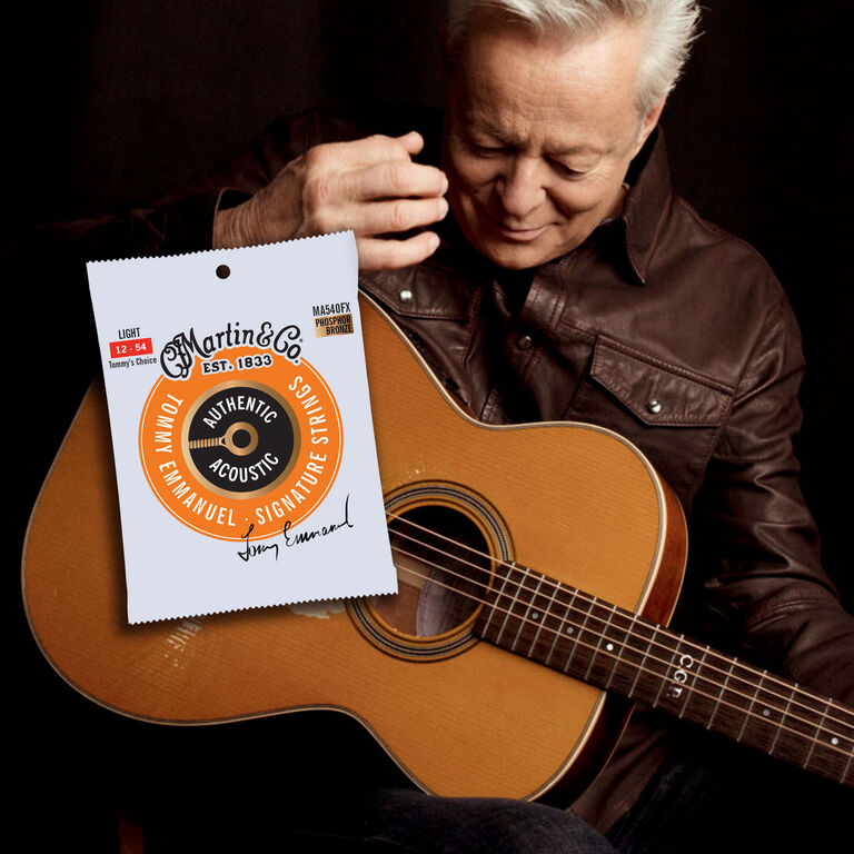 Tommy Emmanuel playing guitar
