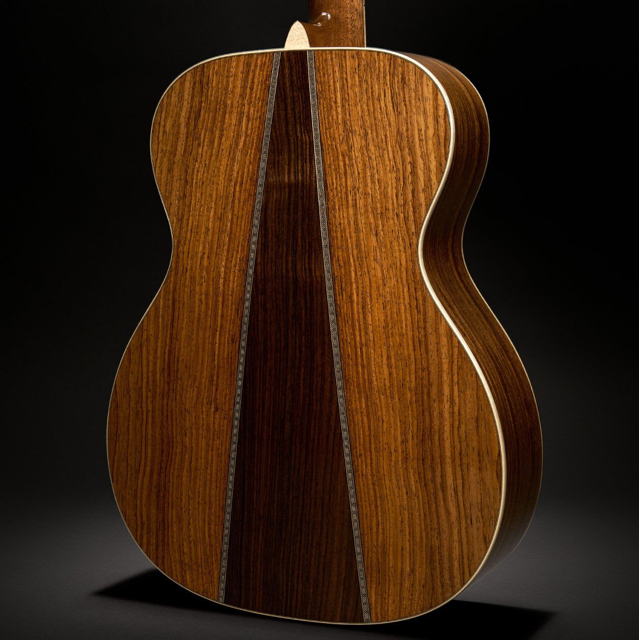 The OM Mikael Akerfeldt acoustic guitar on black background