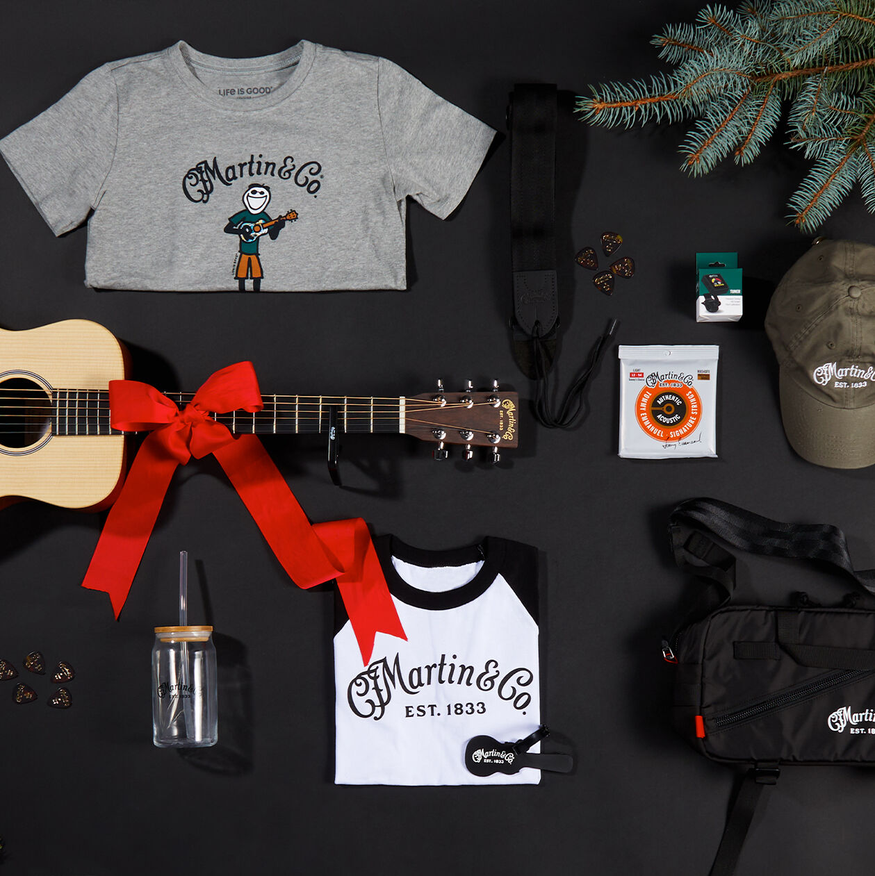Flat lay of beginner and travel Martin Guitar gifts