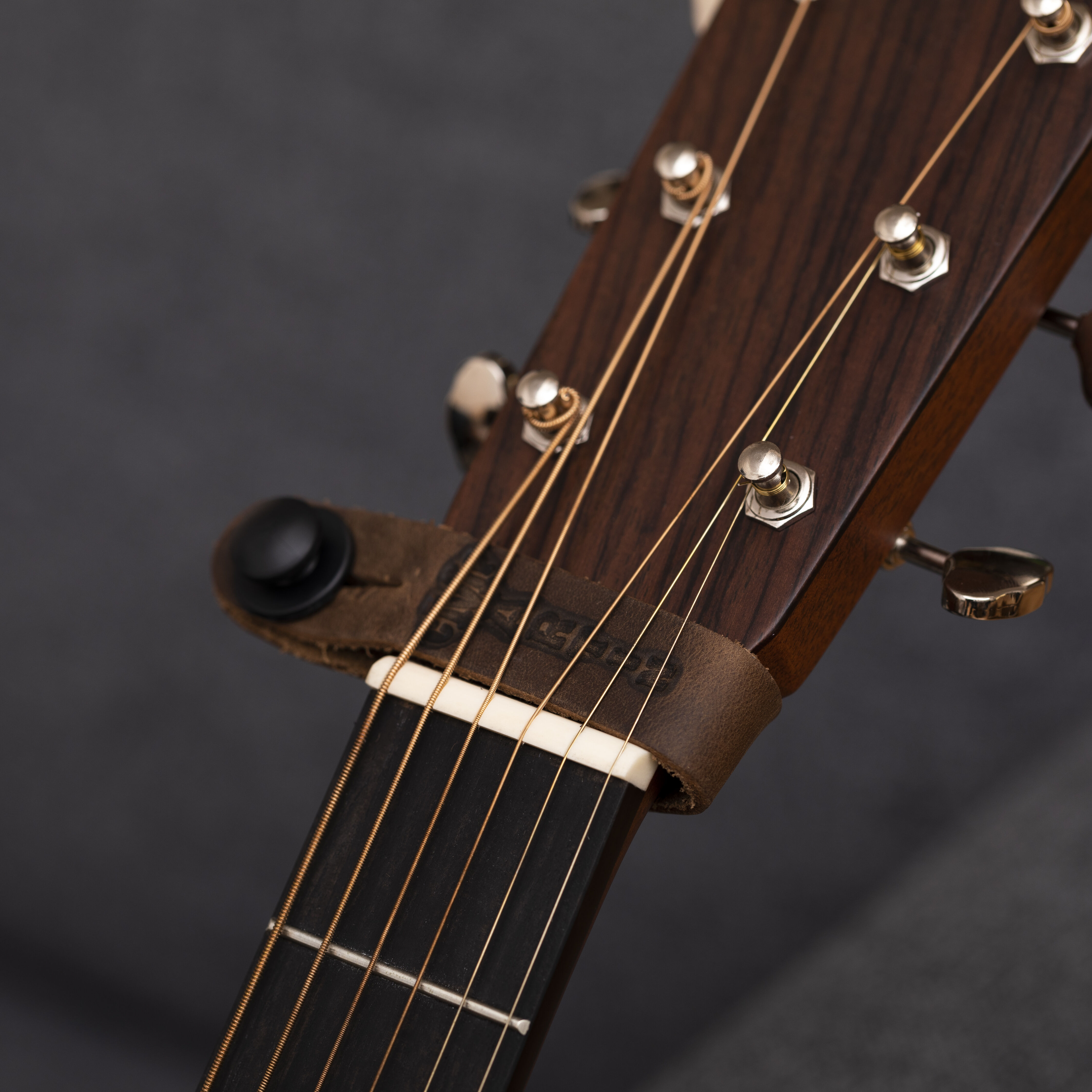 Acoustic guitar shop head