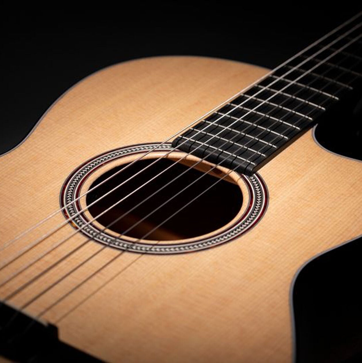 Photo of the top of an acoustic guitar