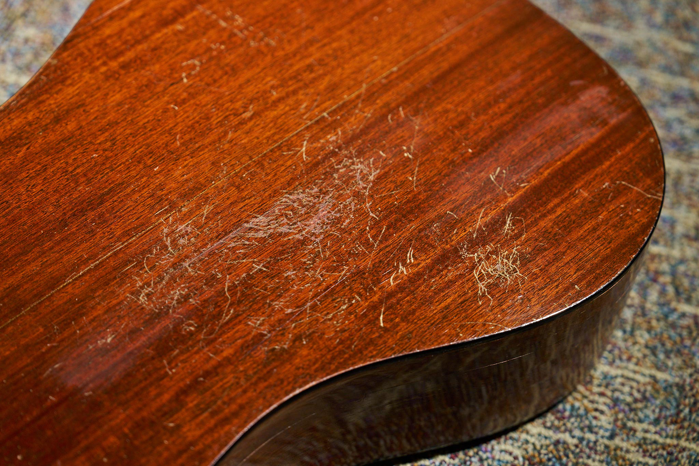A detail shot of the wear and tear on the back of James Taylor's 1937 D-18