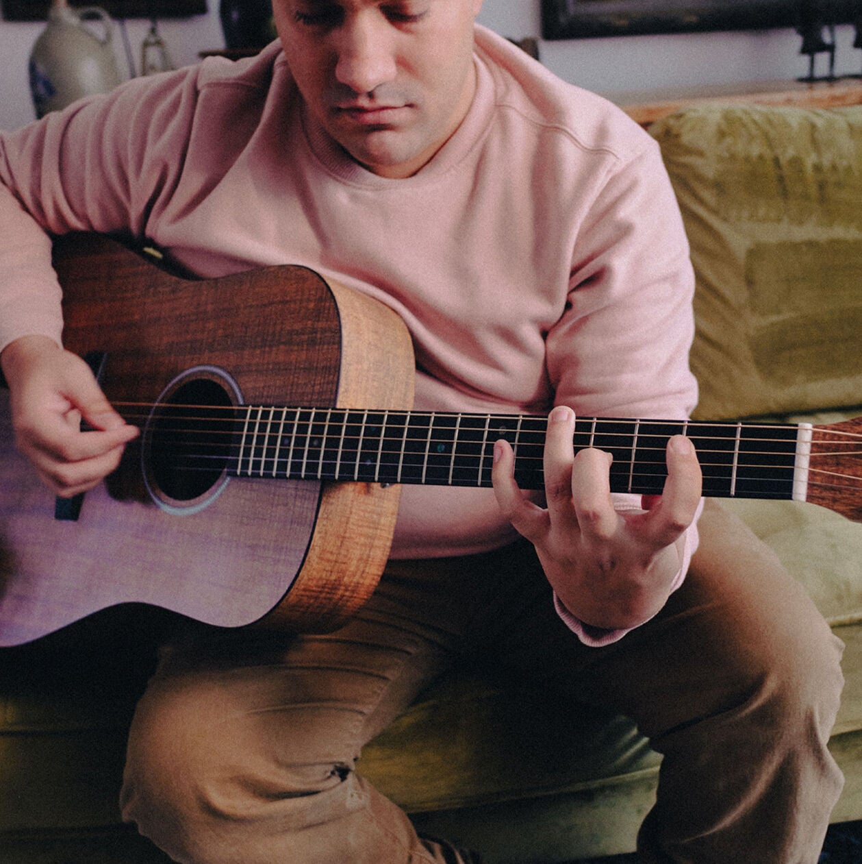 Person playing a guitar