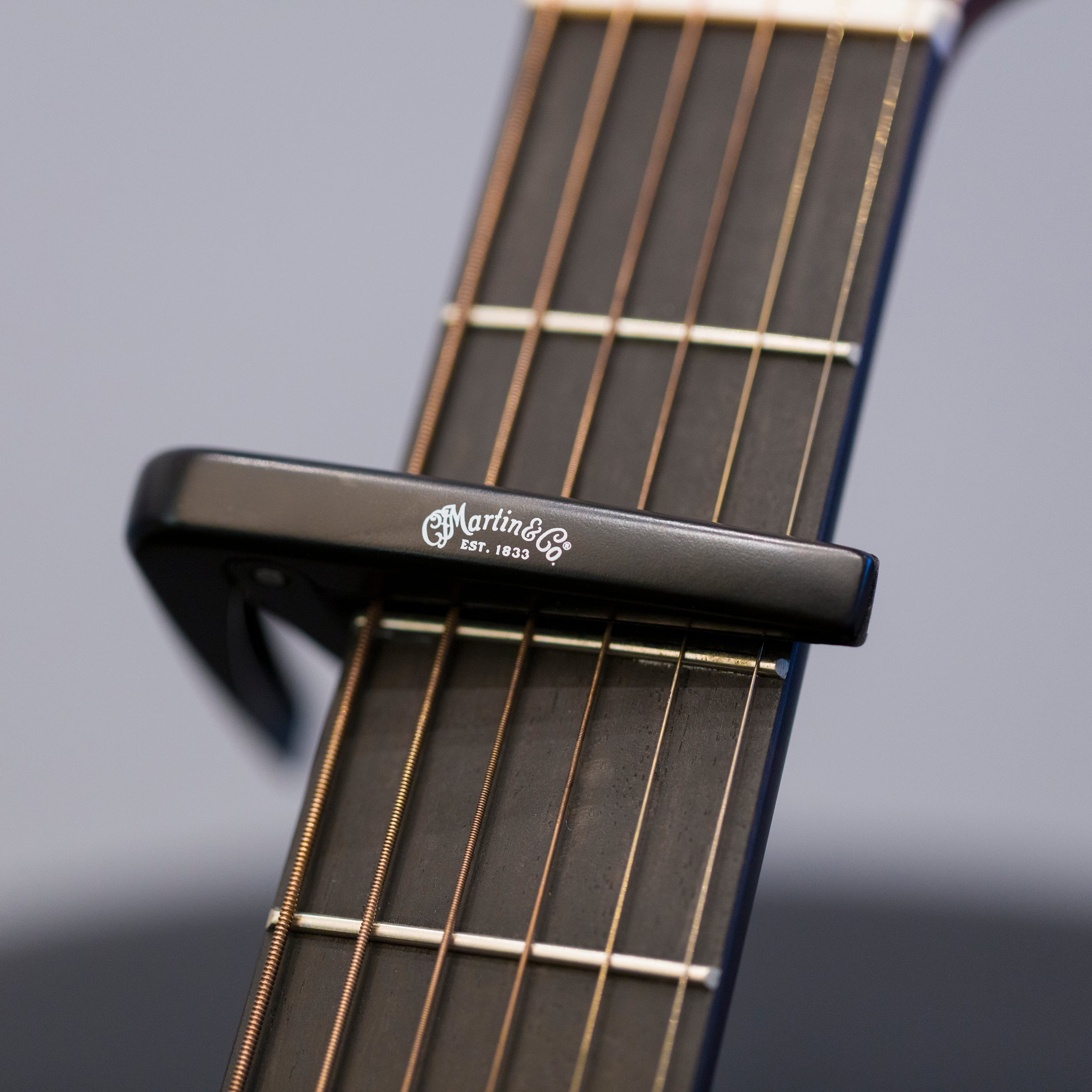 Martin Guitar Capo on a guitar neck image number 10